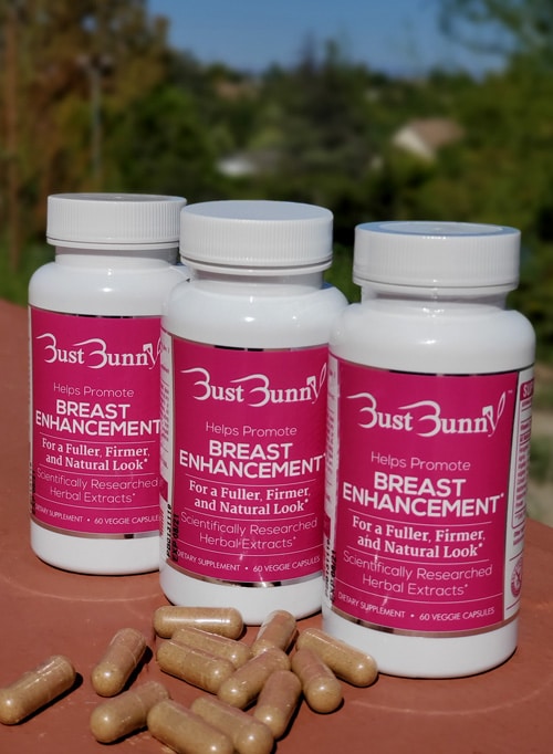 three bottle of breast enhancement supplements